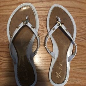 White flip flops with gold stars